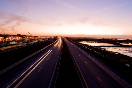 Highway in the sunsetの写真素材