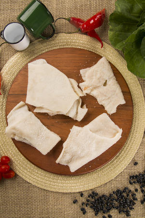 Skin raw pork on wooden backgroundの写真素材