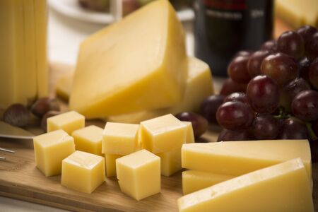 parmesan cheese on a cutting board, delicious foodの写真素材