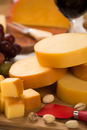 Italian provolone on wooden board, delicious foodの写真素材