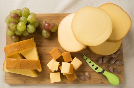 Italian provolone on wooden board, delicious foodの写真素材