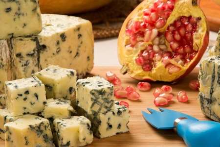 Blue cheese on wooden background, delicious foodの写真素材