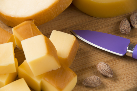 Italian provolone on wooden board, delicious foodの写真素材