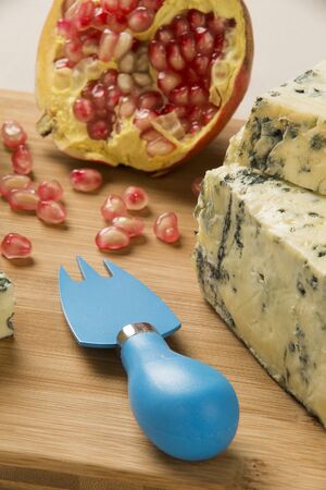Blue cheese on wooden background, delicious foodの写真素材