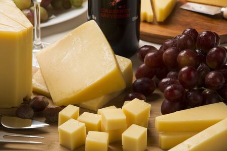 parmesan cheese on a cutting board, delicious foodの写真素材