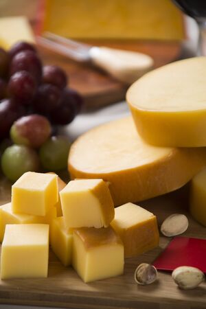 Italian provolone on wooden board, delicious foodの写真素材