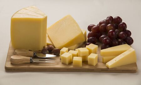 parmesan cheese on a cutting board, delicious foodの写真素材