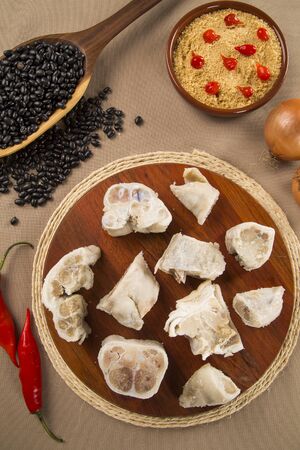 Foot raw pork on wooden backgroundの写真素材