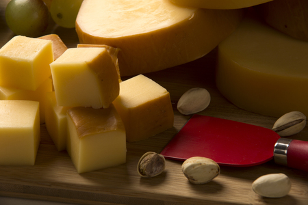 Italian provolone on wooden board, delicious foodの写真素材
