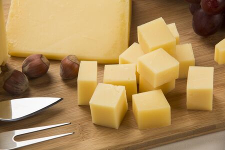 parmesan cheese on a cutting board, delicious foodの写真素材