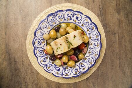 A typical Portuguese dish with codfish called Bacalhau do Porto in a original portuguese plate. Cod Fish Prepared.の写真素材