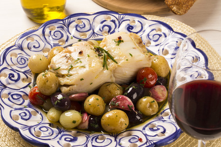 A typical Portuguese dish with codfish called Bacalhau do Porto in a original portuguese plate. Cod Fish Prepared.の写真素材