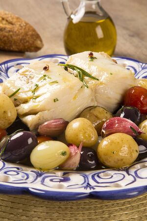 A typical Portuguese dish with codfish called Bacalhau do Porto in a original portuguese plate. Cod Fish Prepared.の写真素材