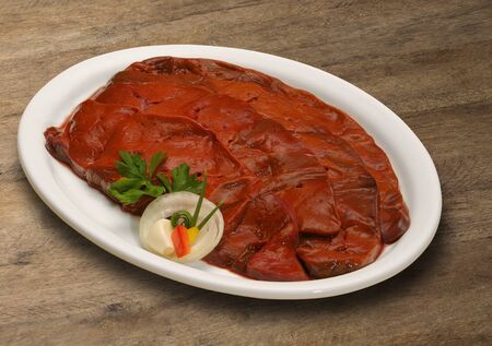Raw meat selection on wooden cutting board. marketの写真素材