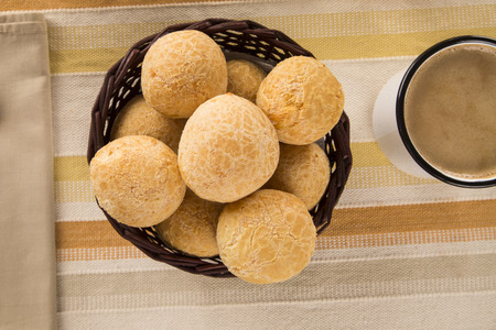 Brazilian cheese buns . Table cafe in the morning with cheese bread and fruits.の写真素材