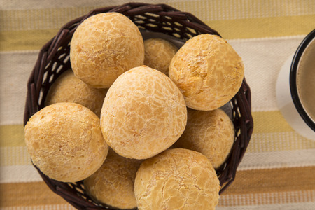 Brazilian cheese buns . Table cafe in the morning with cheese bread and fruits.の写真素材