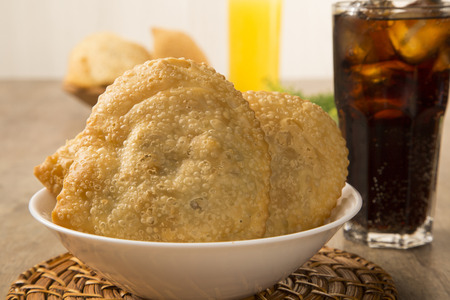Deep fried stuffed pastry. Brazilian food pasteis on the table.