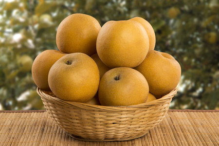 Some asian pears over a wooden surface. Fresh fruitsの写真素材