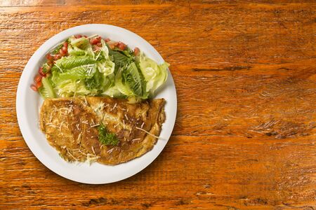 omelet and salad.の写真素材