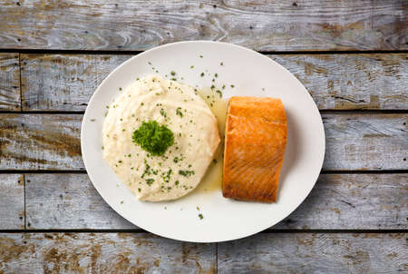 Salmon steak with risotto rice.の写真素材