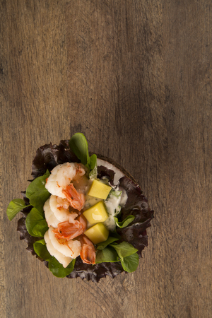 shrimp with salad and mango in coconut.の写真素材