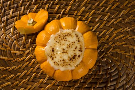 pumpkin stuffed with chicken and cheese.の写真素材