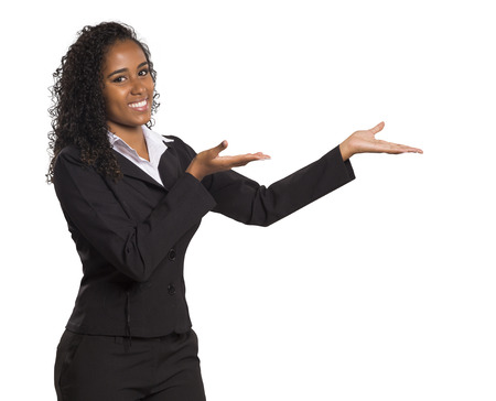 Portrait of a Happy business woman pointing her finger to message on white background.の写真素材