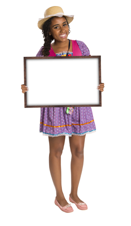 Girl wearing generic caipira clothes as in every Festa Junina or Country Festivals in Brazilの写真素材