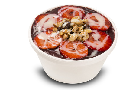 Acai cup. Brazilian famous fruit from Amazon. Acai with strawberry.の写真素材