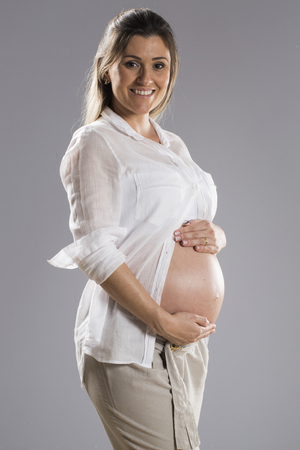 Studio portrait of a pregnant womanの写真素材