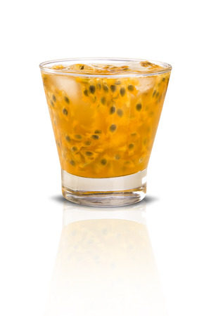 Fresh drink made with passion fruit Caipirinha on white backgroundの写真素材
