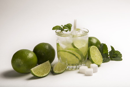 Caipirinha - brazilian's national cocktail made with cachaca, sugar and lemon or lime, isolated on...