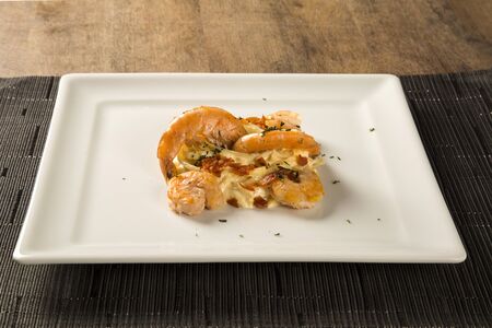 Pasta with shrimps served thyme and cheeseの写真素材