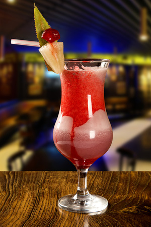 Cocktail on blurry pub backgroundの写真素材