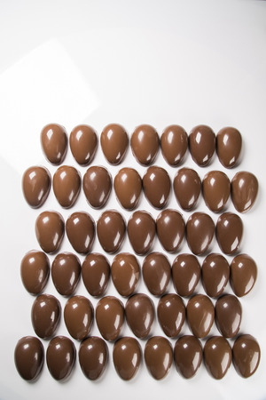 Several easter eggs in the chocolate factoryの写真素材