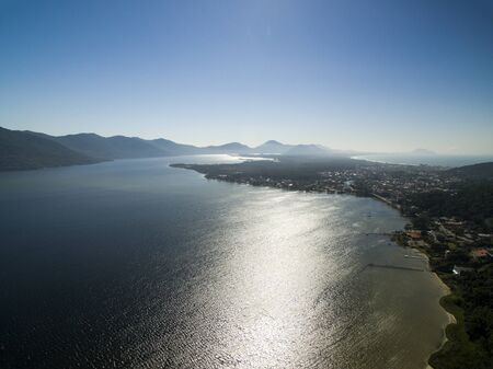 Aerial view Barra da Lagoa Beach in Florianopolis, Brazil. July, 2017.のeditorial素材
