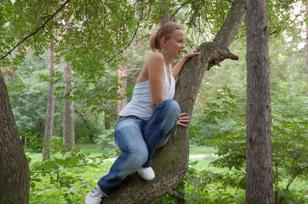 pretty casual girl in parkの写真素材