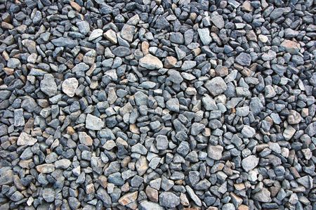 gray crushed stone background (gravel)の写真素材