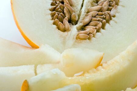 Melon wedges on a white backgroundの写真素材