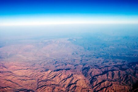 Mountain view from airplane. Vivid colorsの写真素材