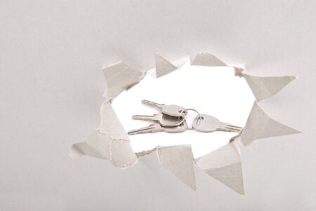 View at keys through hole - concept design backgroundの写真素材