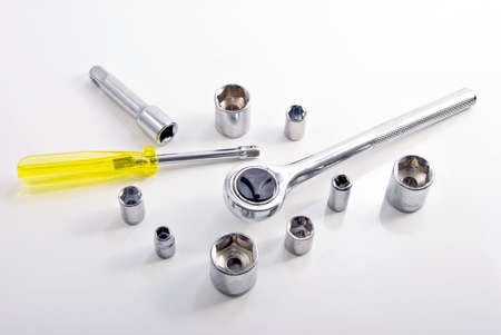 set of metallic tools on white background