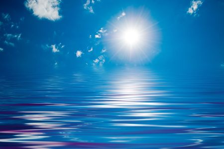 Blue sunny sky with white cloudsの写真素材