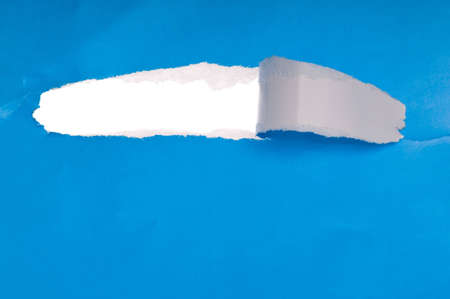 lacerated paper with hole for backgroundの写真素材