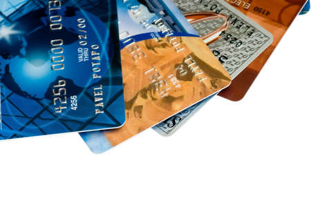 Many plastic bank cards isolated on whiteの写真素材