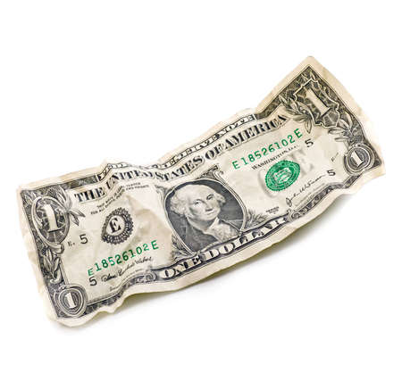 jagged crumple wrinkled dollar isolated on whiteの写真素材