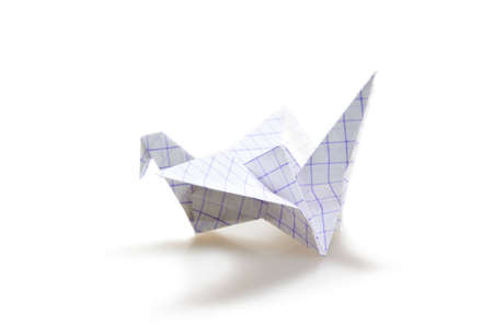 Origami crane isolated over whiteの写真素材