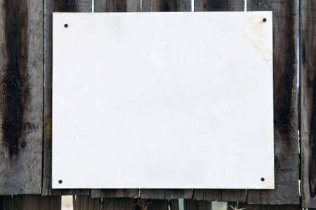 Empty advertisement on old fenceの写真素材