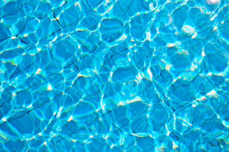tropical pool water with sunlight  reflectionの写真素材