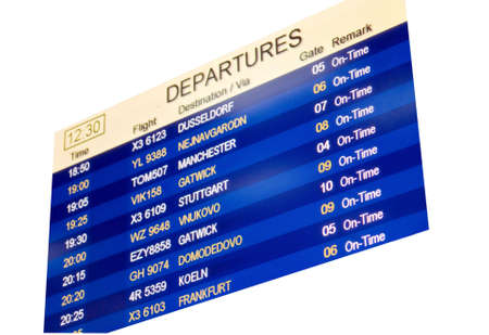 Flight departure information board at airport. Isolated on whiteのeditorial素材